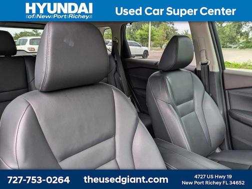 Caspian Blue Metallic/Super Black 2023 Nissan Rogue SL