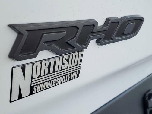 Bright White Clearcoat 2026 RAM 1500 RHO Crew Cab 4x4 5'7' Box
