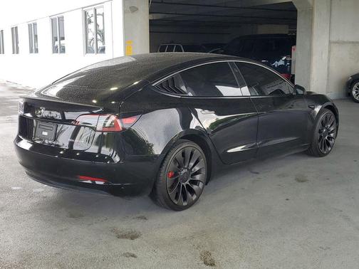 Solid Black 2023 Tesla Model 3 Performance