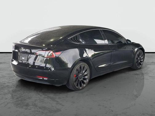 Solid Black 2023 Tesla Model 3 Performance
