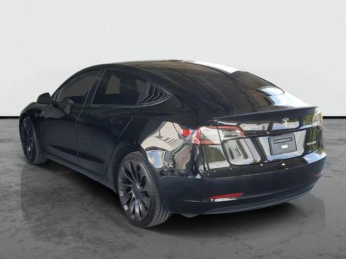 Solid Black 2023 Tesla Model 3 Performance