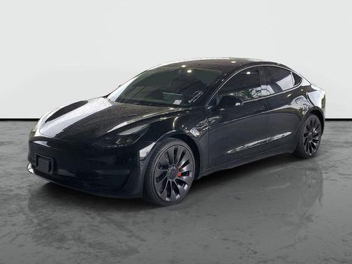 Solid Black 2023 Tesla Model 3 Performance