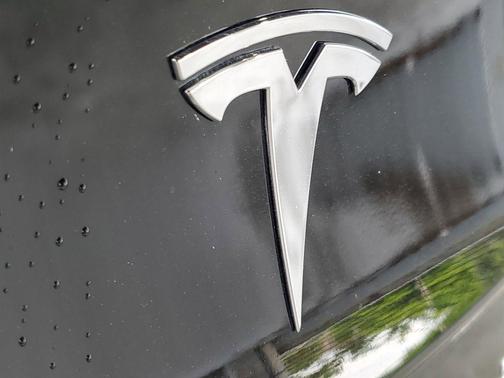 Solid Black 2023 Tesla Model 3 Performance