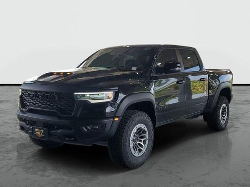 Diamond Black Crystal Pearlcoat 2026 RAM 1500 RHO Crew Cab 4x4 5'7' Box