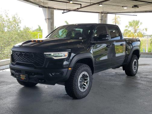 Diamond Black Crystal Pearlcoat 2026 RAM 1500 RHO Crew Cab 4x4 5'7' Box