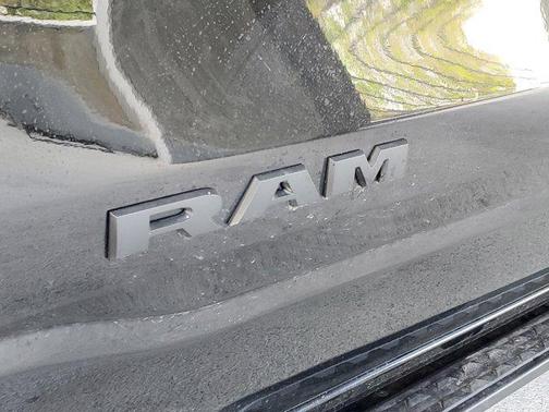 Diamond Black Crystal Pearlcoat 2026 RAM 1500 RHO Crew Cab 4x4 5'7' Box