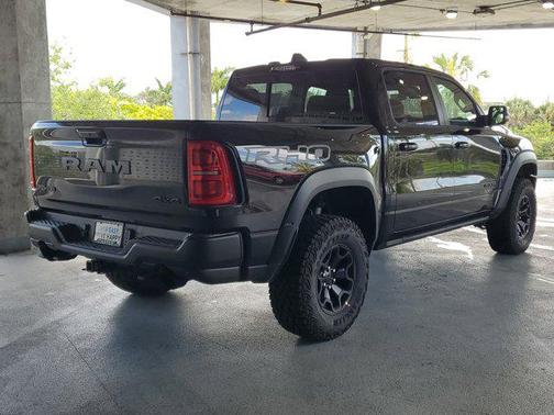 Diamond Black Crystal Pearlcoat 2026 RAM 1500 RHO Crew Cab 4x4 5'7' Box