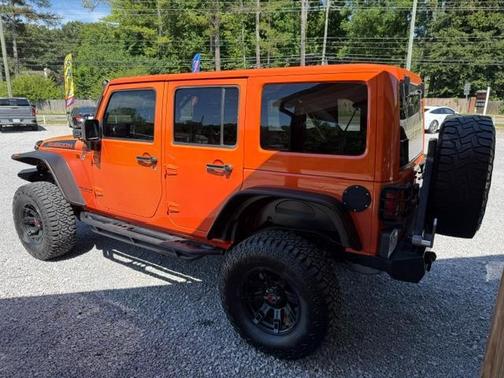 Orange 2015 Jeep Wrangler Unlimited Rubicon