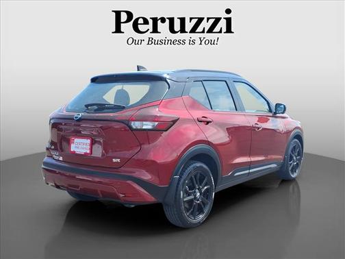 Scarlet Ember Tintcoat/Super Black 2023 Nissan Kicks SR