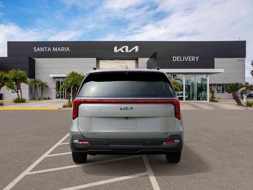 Ivory Silver 2026 Kia Carnival Hybrid SX Prestige