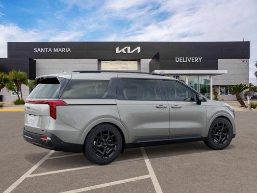 Ivory Silver 2026 Kia Carnival Hybrid SX