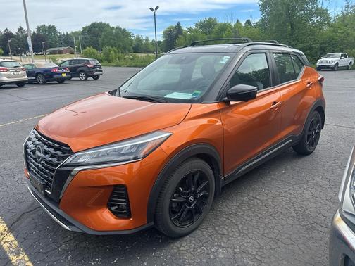 Monarch Orange / Super Black 2023 Nissan Kicks SR