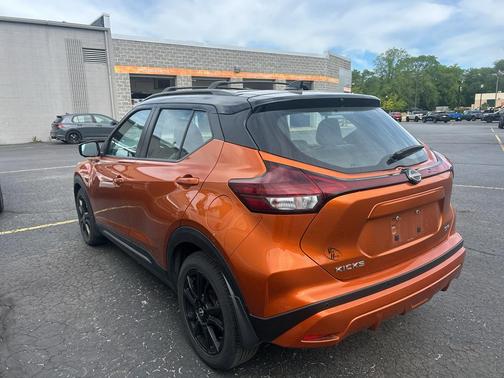 Monarch Orange / Super Black 2023 Nissan Kicks SR