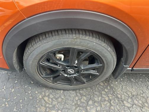 Monarch Orange / Super Black 2023 Nissan Kicks SR