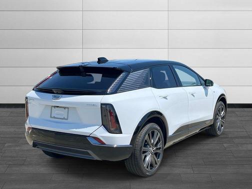 Vibrant White Tricoat 2026 Cadillac OPTIQ Premium Sport