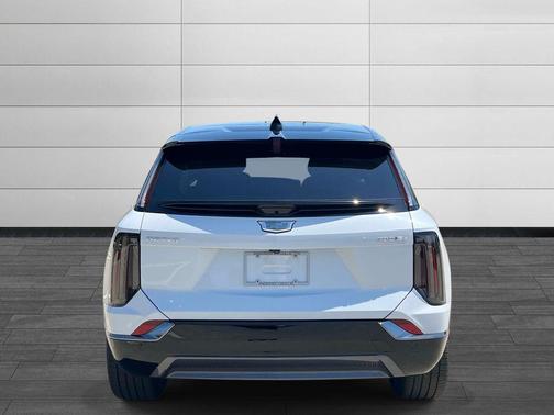 Vibrant White Tricoat 2026 Cadillac OPTIQ Premium Sport