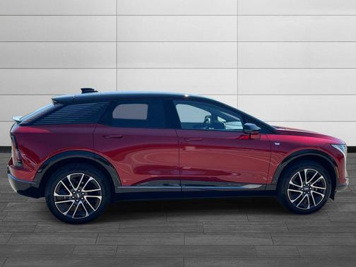 Radiant Red Tintcoat 2025 Cadillac OPTIQ Sport 1 AWD