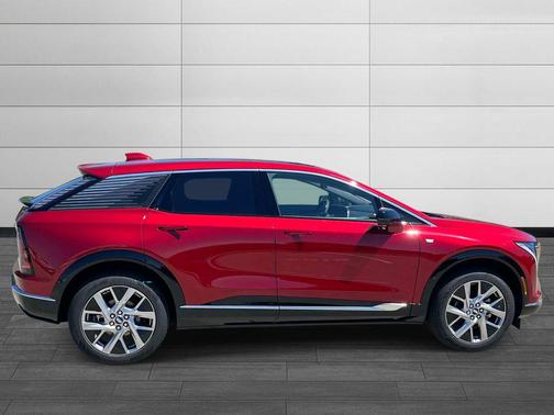 Radiant Red Tintcoat 2026 Cadillac OPTIQ Luxury