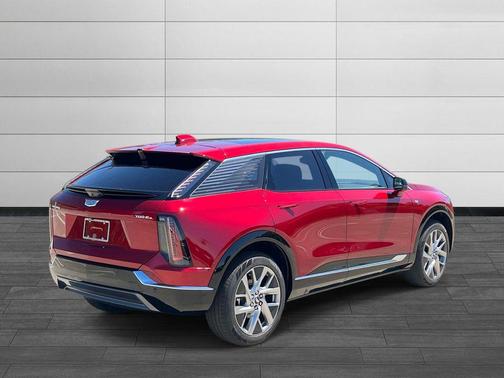 Radiant Red Tintcoat 2026 Cadillac OPTIQ Luxury