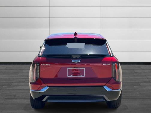 Radiant Red Tintcoat 2026 Cadillac OPTIQ Luxury