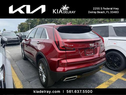 Radiant Red Tintcoat 2024 Cadillac XT4 Premium Luxury