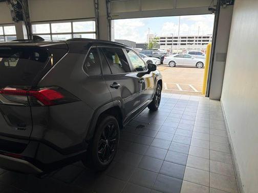 Magnetic Gray Metallic/Midnight Black Metallic 2025 Toyota RAV4 Hybrid SE