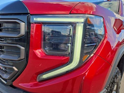 Volcanic Red 2024 GMC Sierra 1500 AT4X