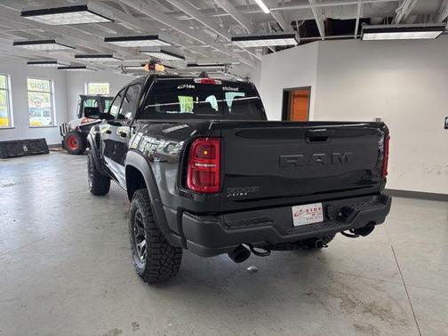 Diamond Black Crystal Pearlcoat 2026 RAM 1500 RHO Crew Cab 4x4 5'7' Box