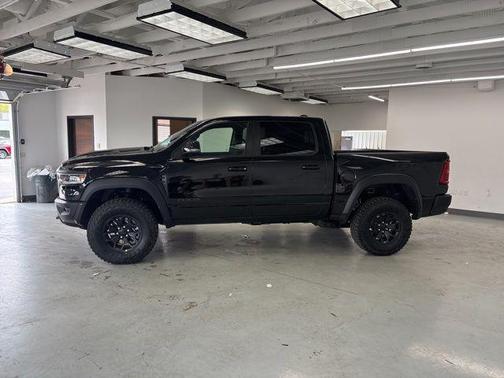 Diamond Black Crystal Pearlcoat 2026 RAM 1500 RHO Crew Cab 4x4 5'7' Box