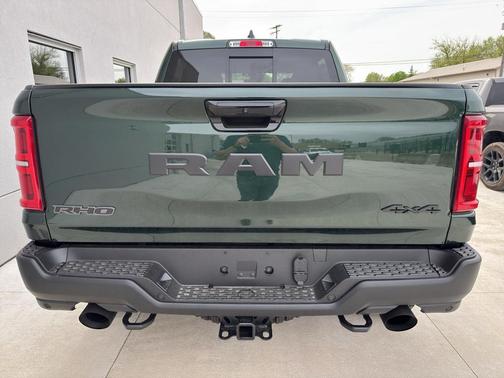 Serrano Green Metallic 2026 RAM 1500 RHO Crew Cab 4x4 5'7' Box