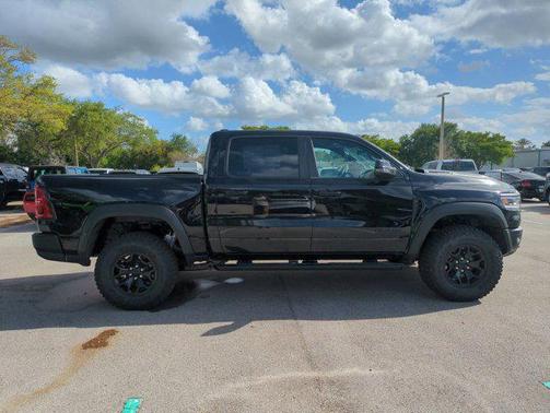 Diamond Black Crystal Pearlcoat 2026 RAM 1500 RHO Crew Cab 4x4 5'7' Box