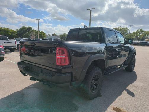 Diamond Black Crystal Pearlcoat 2026 RAM 1500 RHO Crew Cab 4x4 5'7' Box