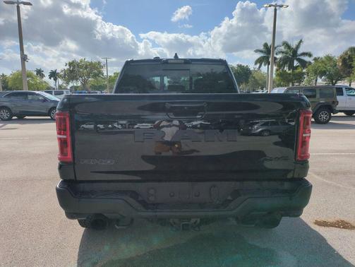 Diamond Black Crystal Pearlcoat 2026 RAM 1500 RHO Crew Cab 4x4 5'7' Box