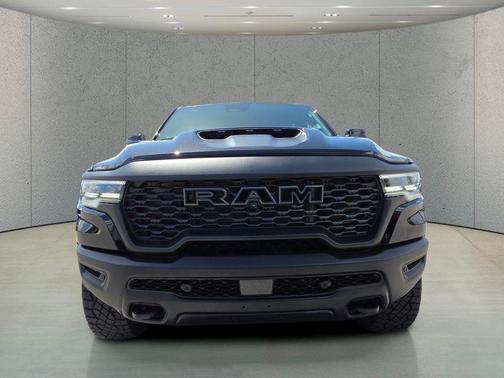 Diamond Black Crystal Pearlcoat 2026 RAM 1500 RHO Crew Cab 4x4 5'7' Box