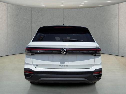 Pure White 2025 Volkswagen Taos 1.5T SE Black