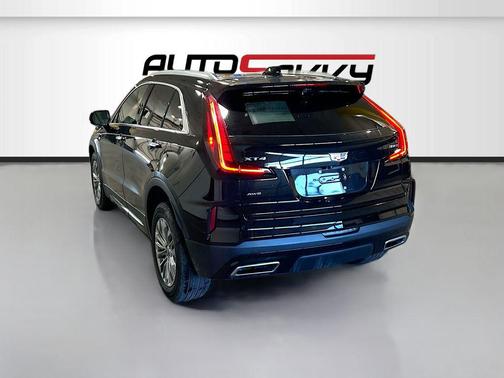 Stellar Black Metallic 2024 Cadillac XT4 Premium Luxury