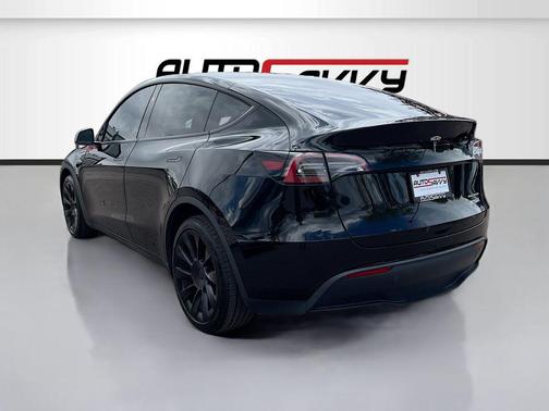 Solid Black 2024 Tesla Model Y Long Range Dual Motor All-Wheel Drive
