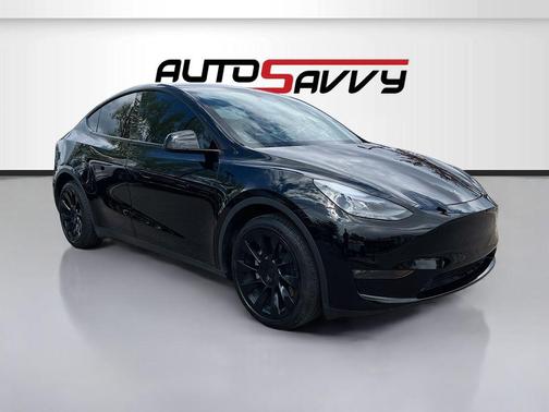 Solid Black 2024 Tesla Model Y Long Range Dual Motor All-Wheel Drive