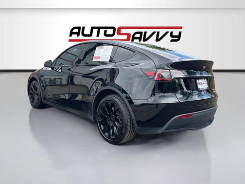 Solid Black 2024 Tesla Model Y Long Range Dual Motor All-Wheel Drive