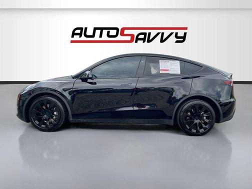 Solid Black 2024 Tesla Model Y Long Range Dual Motor All-Wheel Drive