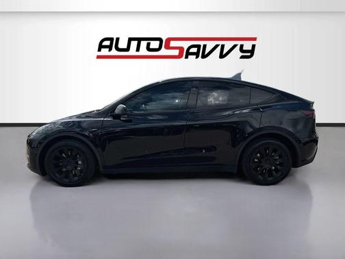 Solid Black 2024 Tesla Model Y Long Range Dual Motor All-Wheel Drive