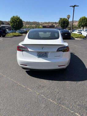 Pearl White Multi-Coat 2023 Tesla Model 3 Performance