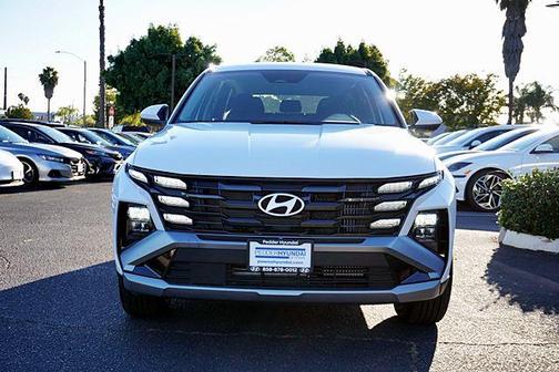 Creamy White Pearl 2026 Hyundai TUCSON Hybrid Blue SE