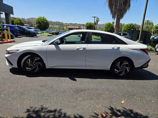 Serenity White 2025 Hyundai ELANTRA HEV SEL Sport