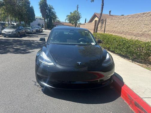Solid Black 2023 Tesla Model 3 Standard Range