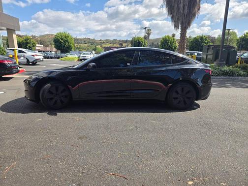 Solid Black 2024 Tesla Model 3 Long Range