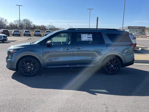 Blue 2026 Kia Carnival SX