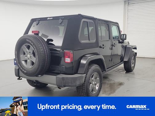 Black 2015 Jeep Wrangler Unlimited Freedom