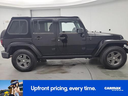 Black 2015 Jeep Wrangler Unlimited Freedom