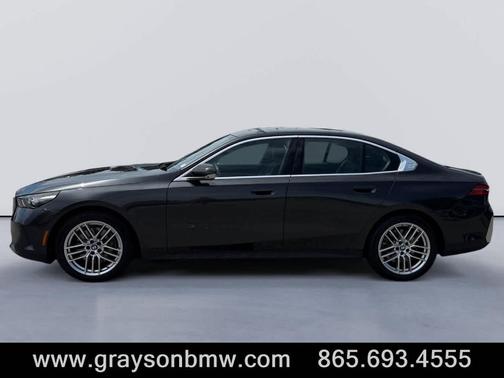 Black 2025 BMW 540 i xDrive